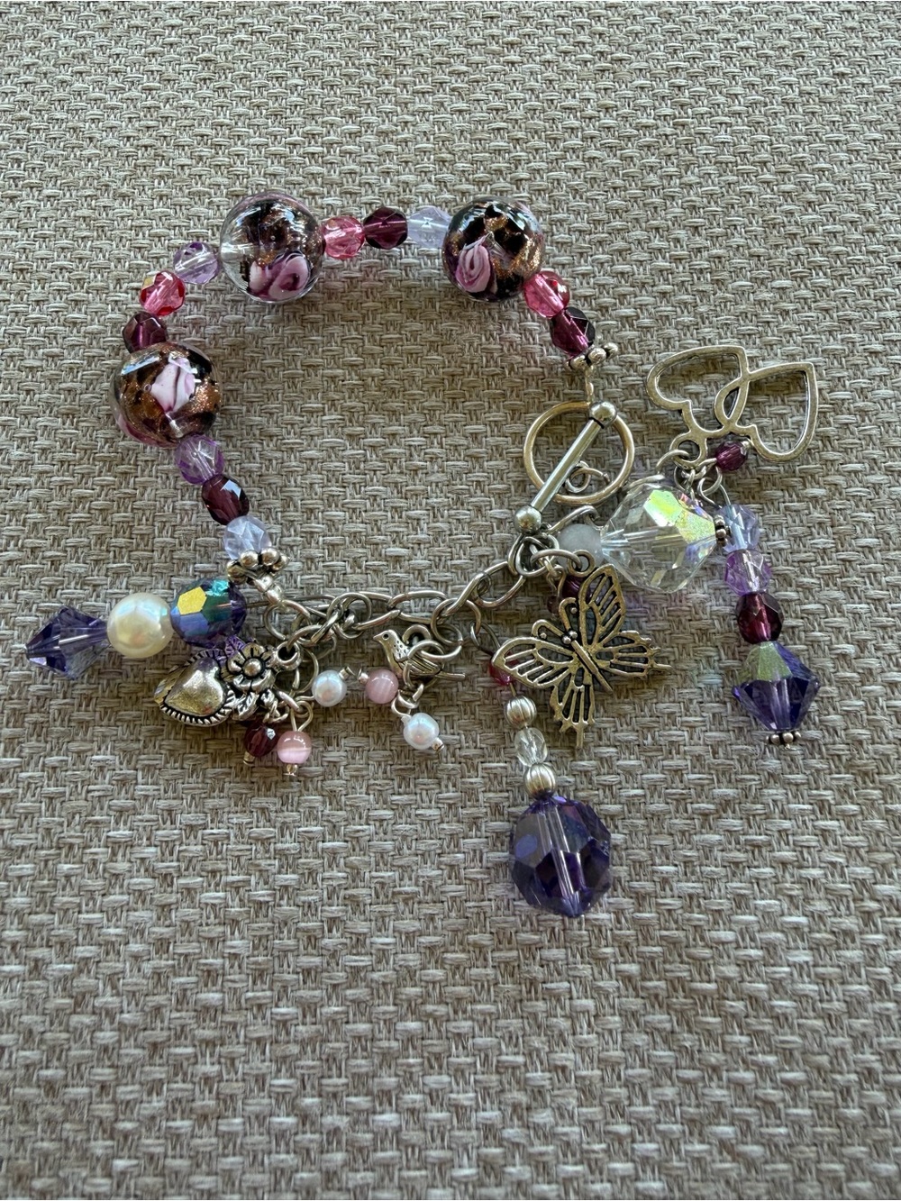 Purple and Pink Charm Bracelet with Butterfly Accent